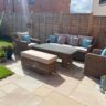 Raj Green Indian sandstone paving slab with green, grey and brown riven natural surface