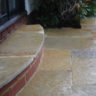 Close-up of Raj Green sandstone showing hand-cut edge and 22mm calibrated thickness